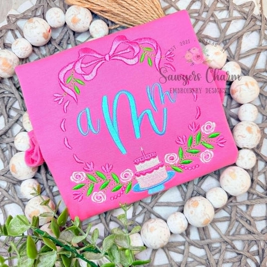 Floral birthday monogram frame, satin stitch/fill stitch machine embroidery design, coquette bow, crest, ribbons, cake, candle, laurel