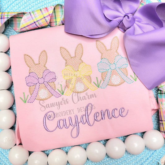 Easter bunnies with coquette bow in grass sketch stitch trio machine embroidery design, quick stitch, French knot tail, peter cottontail