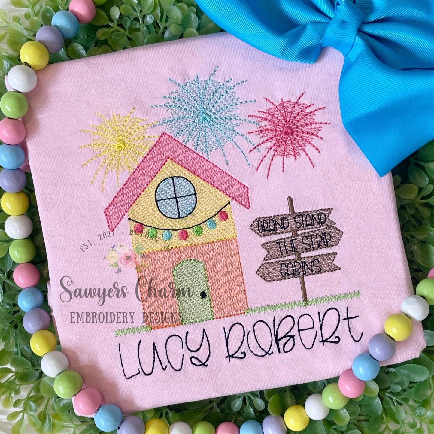 Colorful cabin with signs, lights, & fireworks fair scene sketch stitch machine embroidery design file, county fair, summer, rides