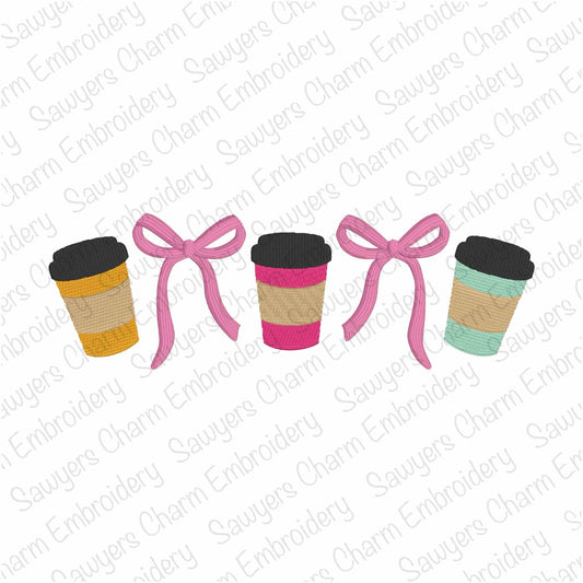 Two coffee cups with bows on a white background with 'Sauyer's Charm Embroidery' watermark.