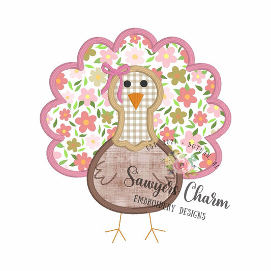 Decorative turkey design with floral pattern and 'Sawyer's Charm Embroidery Designs' branding on a white background.