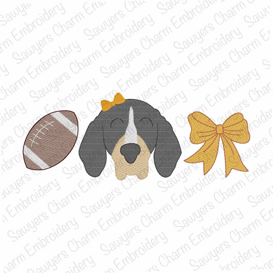 Dog face with a football, yellow bow, and gold bow on a white background with 'Sauyer's Charm Embroidery' watermark.