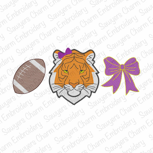 Embroidery design of a tiger face with a football and purple bow on a white background.