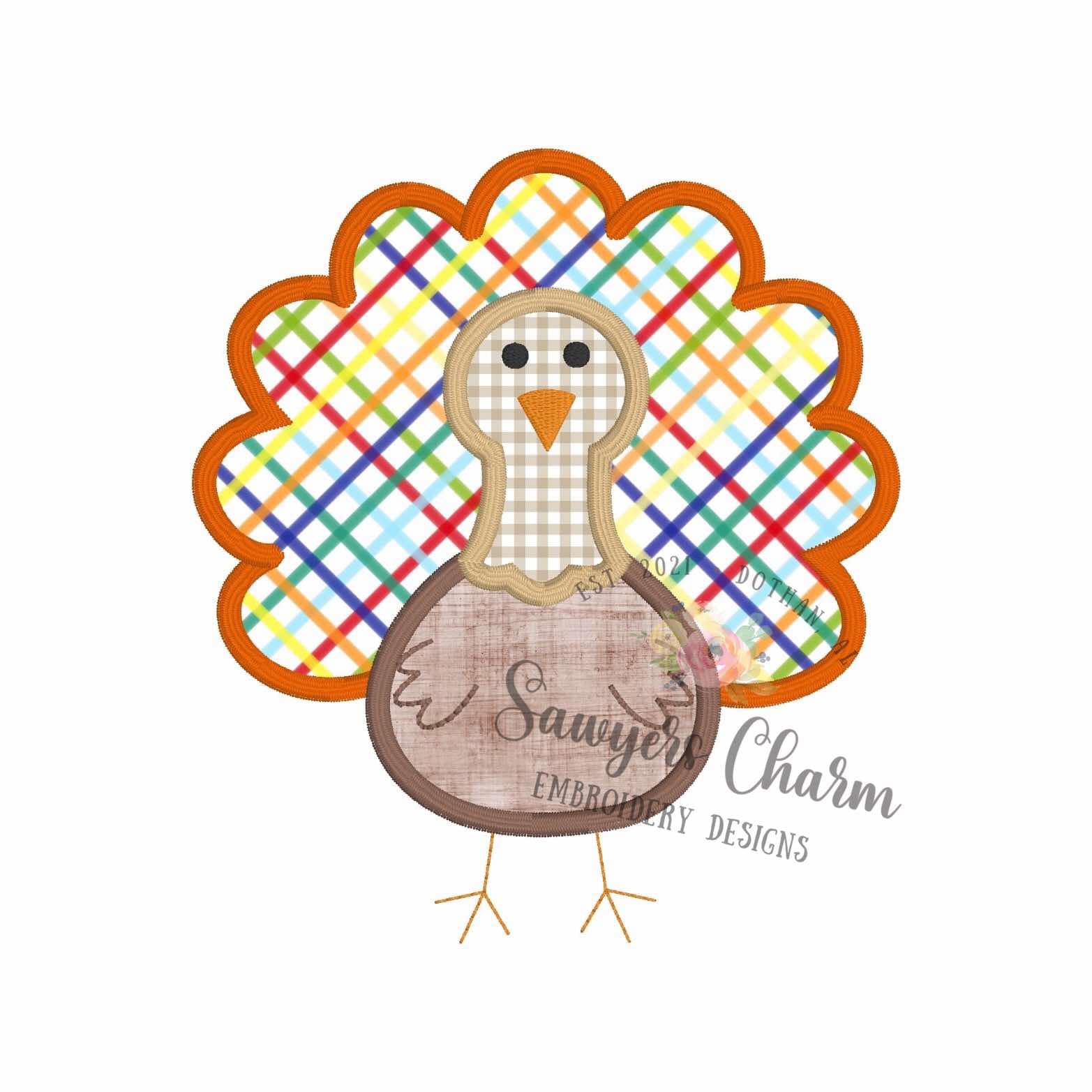 Colorful plaid turkey design with 'Sawyer Charm Embroidery Designs' text on a white background